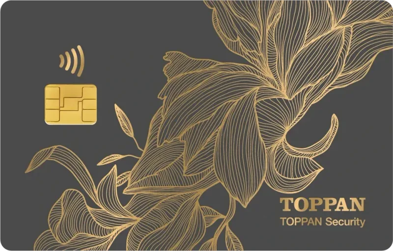 SuperMetal Pure graphite card with fine gold botanical engraving and a gold chip